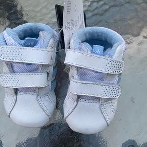 Adidas baby shoes, NWT, smoke free and pet friendly home.